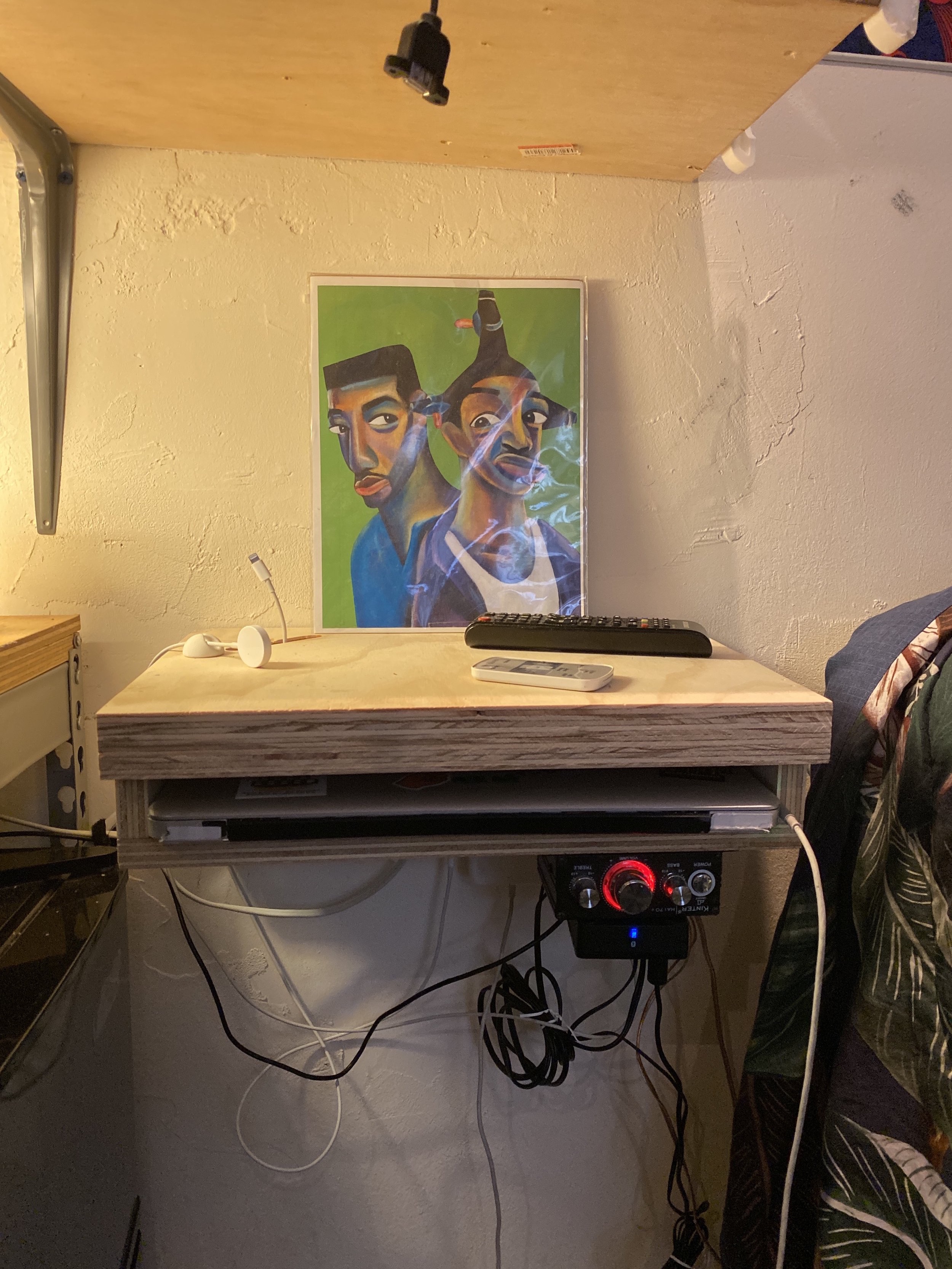 Custom wooden shelf and desk built in a Queens apartment by Jose Does It.