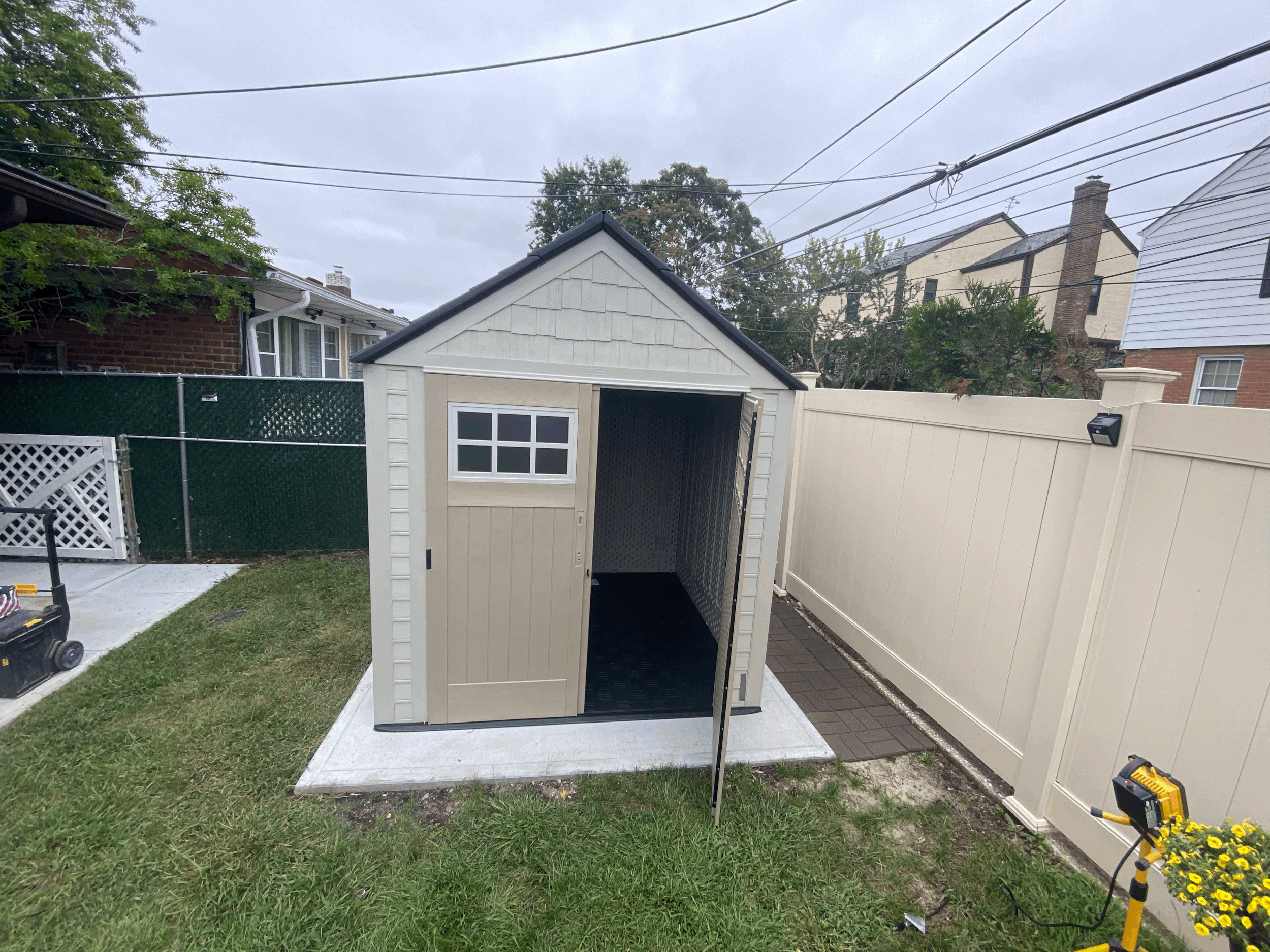 Rubbermaid storage shed built on a concrete pad on Long Island by Jose Does It.