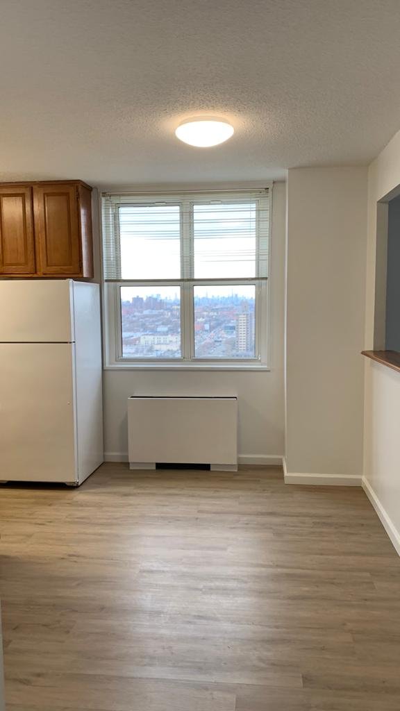 Full interior repaint and LVP installation in Brooklyn by Jose Does It.