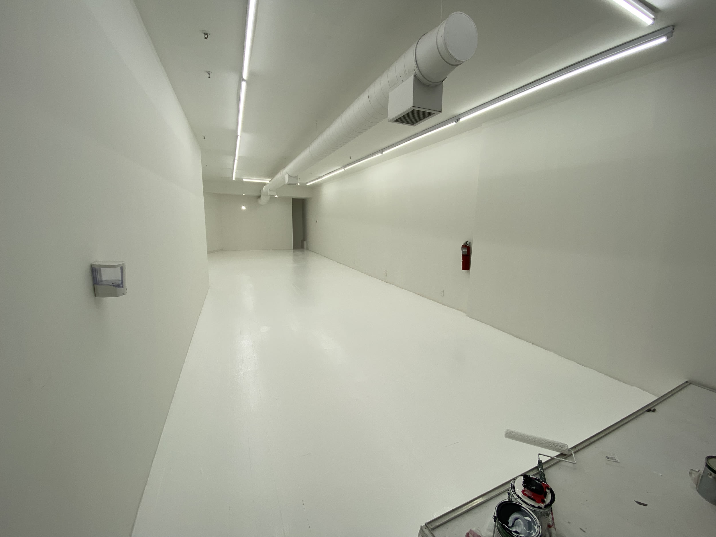Floor painting and light fixture installation in Manhattan by Jose Does It.